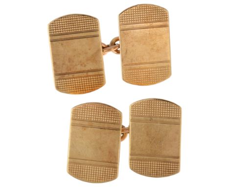 A pair of mid-20th century 9ct gold cufflinks, maker HH&S, Birmingham 1953, curved rectangular panels with engine turned deco
