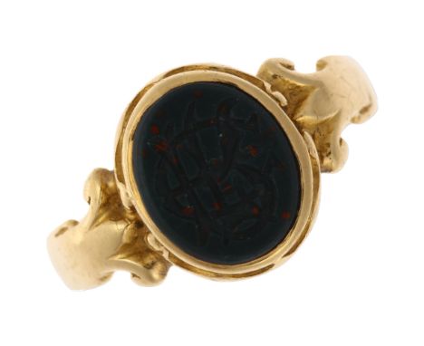 A 19th century 18ct gold bloodstone seal signet ring, oval panel intaglio carved with monogram RFE?, setting height 10.8mm, s