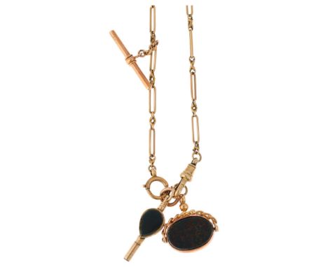 An early 20th century 9ct gold fancy bar link Albert chain necklace, with 9ct bloodstone spinner fob, hardstone watch key and