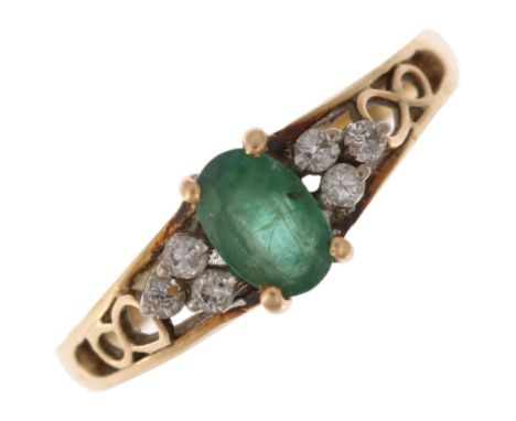 A late 20th century 9ct gold emerald and diamond dress ring, maker DJ, import London 1984, claw set with 0.35ct oval mixed-cu