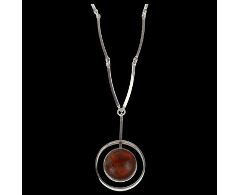 NIELS ERIK FROM - a Danish modernist sterling silver and amber openwork pendant necklace, set with round cabochon amber and c