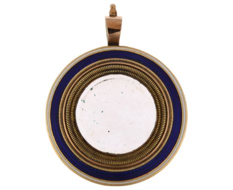 A Georgian blue and white enamel double-sided mourning locket pendant, circa 1800, circular form with central bevelled glass 