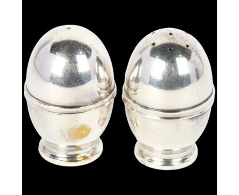 A pair of Danish silver egg pepperettes, Scandinavisk Guld & Solv, 5.5cm, 1.5oz totalNo damage or repair, only light surface 
