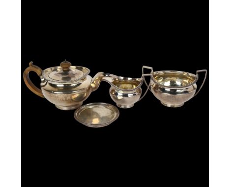 A George III silver 4-piece tea set, Thomas Robins, London 1803, circular bulbous form with gadrooned rims, gilt interior and