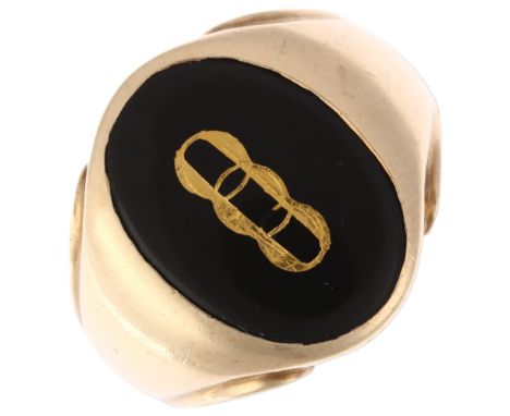 A large American 9ct gold black onyx Oddfellows signet ring, intaglio carved and gilt with insignia, setting height 19.3mm si