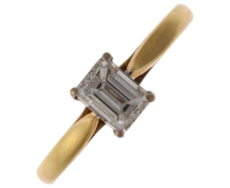 An 18ct gold 0.7ct solitaire diamond ring, maker RB, London 1999, claw set with emerald-cut diamond, colour approx G/H, clari