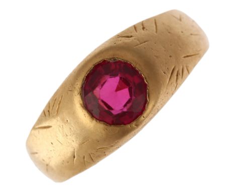 An early 20th century solitaire synthetic ruby gypsy ring, rub-over set with 1.25ct round-cut synthetic ruby, settings appare