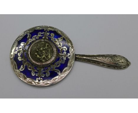 A silver and enamel mirror set with a cameo