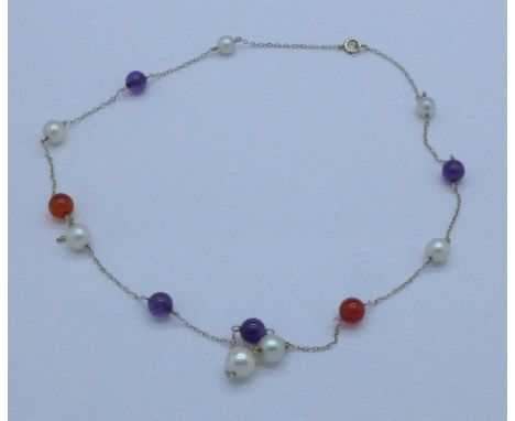 A 9ct gold bead and pearl set necklet