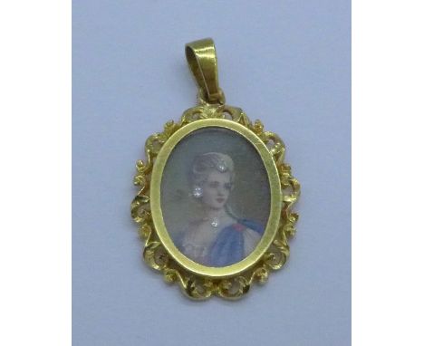 An 18ct gold and diamond portrait pendant, 2.5cm, 2.7g