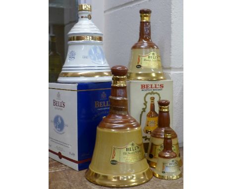 Five Bell's Old Scotch Whisky decanters, (two boxed), including Christmas 2001