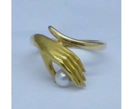 An 18ct gold and pearl set ring, 4.8g, M