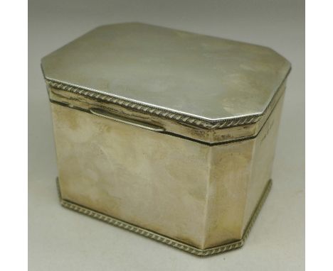 A silver caddy, 690g, 24.3oz, Birmingham 1934