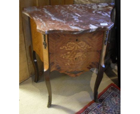 A French kingwood and marquetry inlaid two drawer commode of small proportions with rosso marble top raised on cabriole legs 