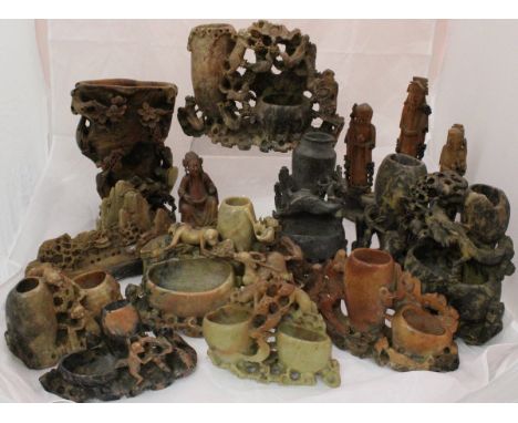 A collection of eleven pieces of Chinese carved soapstone including various vases, figure groups, etc, together with a gradua