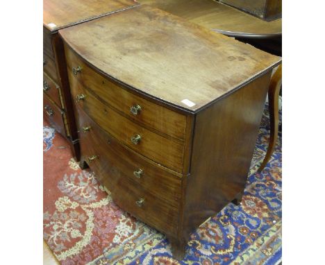 A 19th Century mahogany commode as a bow fronted chest of four drawers