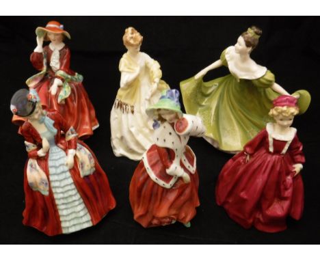 A collection of three Royal Doulton figurines including "Top 'o the Hill" (HN1834), "Christmas Morn" (HN1992), "Lynne" (HN232