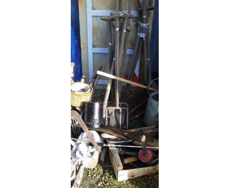 A large quantity of assorted items to include long handled tools, various hand tools, a white line painter, zinc lidded pots 