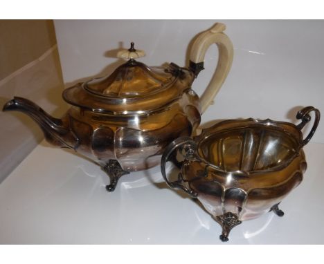 A James Dixon & Son late 19th Century silver plated teapot and matching twin-handled sucrier, together with a Victorian plate