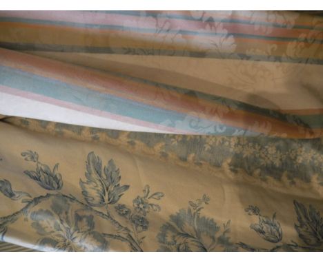 A collection of curtains to include a single cotton interlined curtain, the cream ground set with pale blue floral decoration