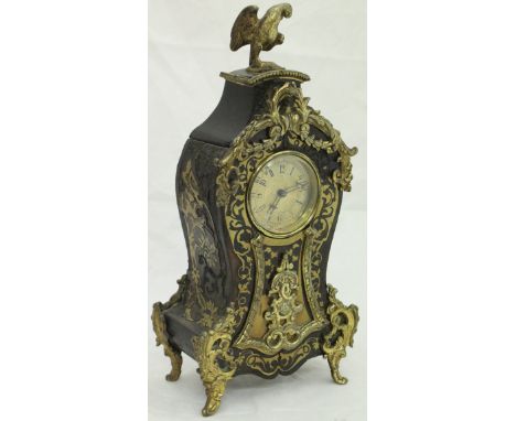 A French boulle work cased mantle clock with parrot surmount, the circular brass dial with Arabic numerals