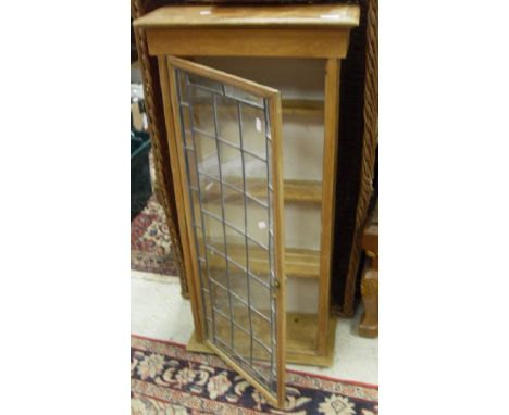 A pine wall-hanging display cabinet with a leaded glazed door enclosing shelves, together with three further 20th Century dis