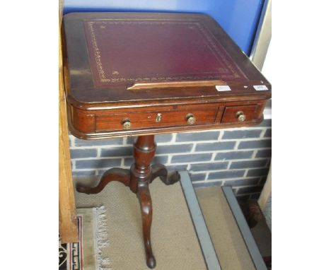 An early 19th Century mahogany reading table, the adjustable slope top with tooled and gilded leather writing surface over tw