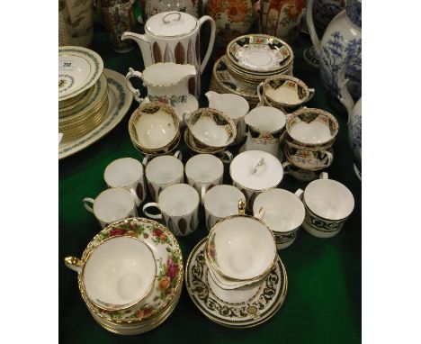 A Susie Cooper bone china coffee set, Hyde Park pattern, comprising six cans and saucers and three piece set, together with v