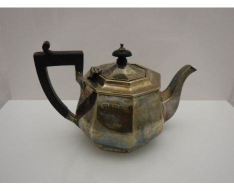 An early 20th Century teapot of small proportions and faceted baluster form (Birmingham 1913) 