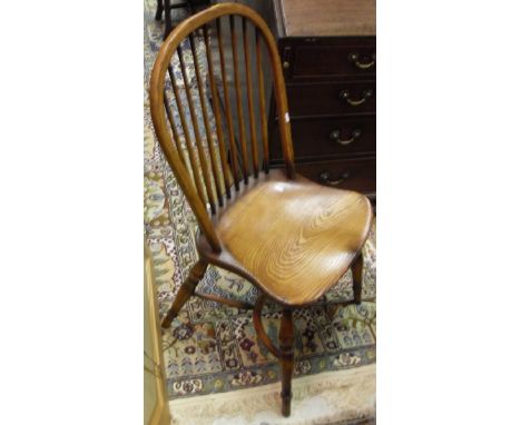 A set of five Ash and Elm stick back dining chairs on turned legs united by crinoline stretchers CONDITION REPORTS All chairs