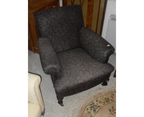 A circa 1900 upholstered scroll armchair on cabriole front legs to pad feet and castors, together with a 1930's single door d