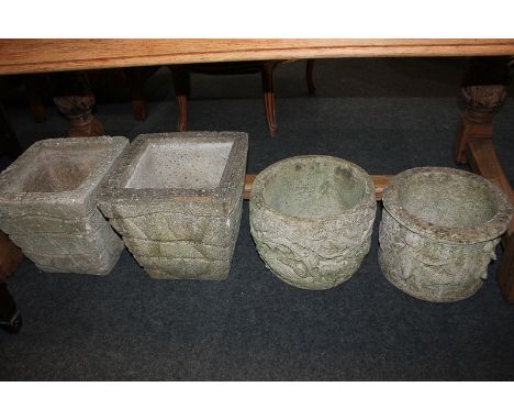 Two circular composite garden planters, decorated in light relief with figures and animals, largest 30cm diameter, together w
