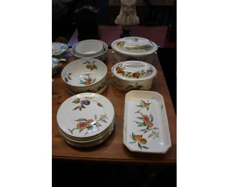 A collection of Royal Worcester Evesham pattern tableware comprising two large tureens and covers of graduated size, two larg