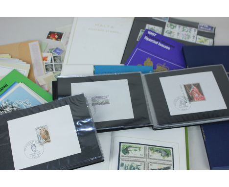 Six albums of British, European and world stamps and first day covers, together with some loose