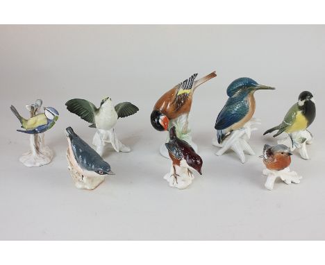 Three Goebel porcelain models of birds, blue tit, dipper and chaffinch, a Beswick nuthatch, three Karl Ens birds (all a/f), a