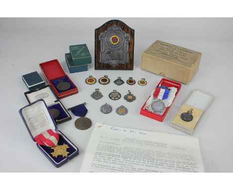 Belgrave Harriers, a collection of early 20th century silver and other sporting medals including plaque and enamel medals awa