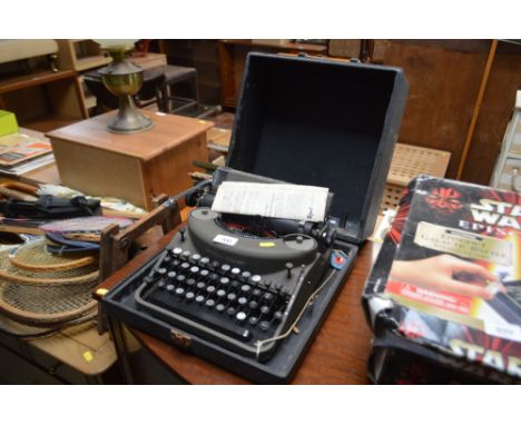 A Remington portable typewriter in fitted case