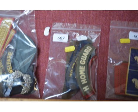 A quantity of British army badges