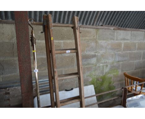 A wooden extending ladder