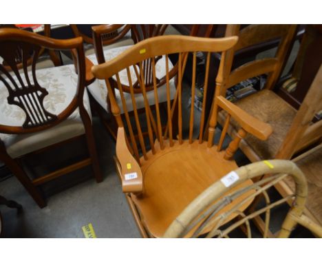 A beech stick back rocking chair 