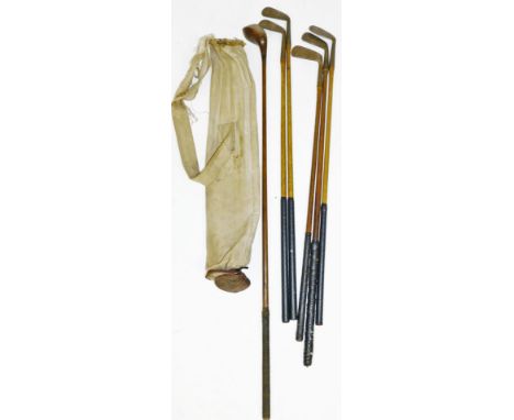 A set of vintage hickory shafted golf clubs, comprising Gibson Westward Ho Brassie, Martin and Kirkaldy Cleek, Jas Frew (Leed