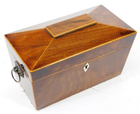 An early 19thC sarcophagus shaped mahogany tea caddy, of rectangular form with fitted interior and ring side handles, 17cm H,