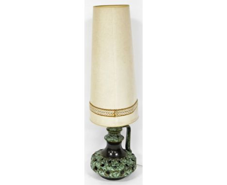 A retro pottery ewer lamp, of part pierced form, with pottery base in green splashes with a circular tapering shade, 130cm H.