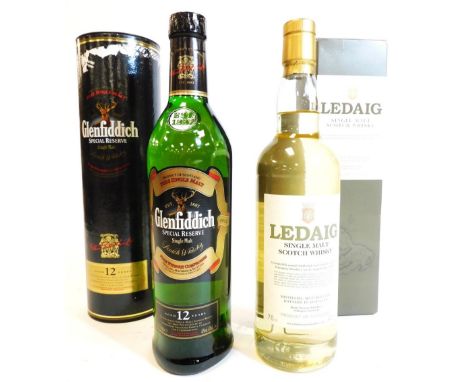 Two bottles of whisky, a bottle of Ledaig single malt Scotch whisky in presentation box and a bottle of Glenfiddich Special R