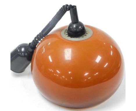 A vintage plastic pull down light shade, with coil mount and amber coloured shade, 37cm W.
