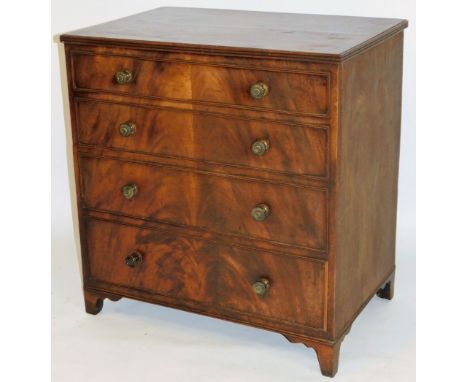 An early 19thC mahogany chest commode, with hinged centre, vacant interior and stylized splayed feet, 72cm H, 68cm W, 45cm D.