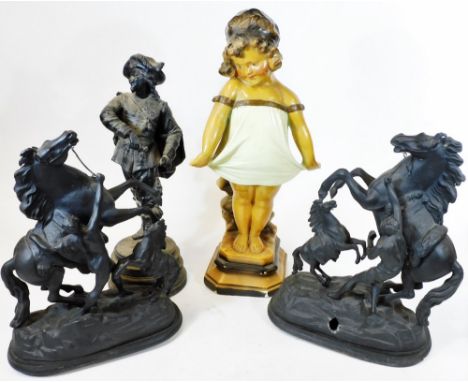 A pair of spelter Marley horses, each on a shaped base, (AF), a spelter figure of a French soldier and a Art Deco painted pla