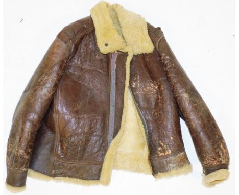 A vintage brown leather flying jacket, with label for US Army Air Force, made by the Aero Leather Clothing Company, size 42 r