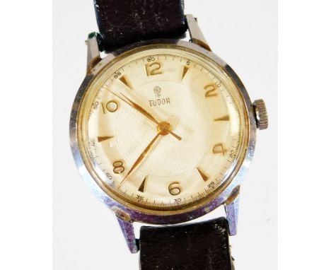 A vintage Rolex Tudor wristwatch, with chrome plated case, 3cm Dia. baton and Arabic numeral dial, marked Tudor, with leather
