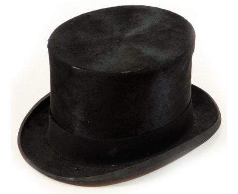 A vintage silk top hat by Harman &amp; Son, London.